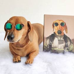 A pet parent unwrapping a portrait